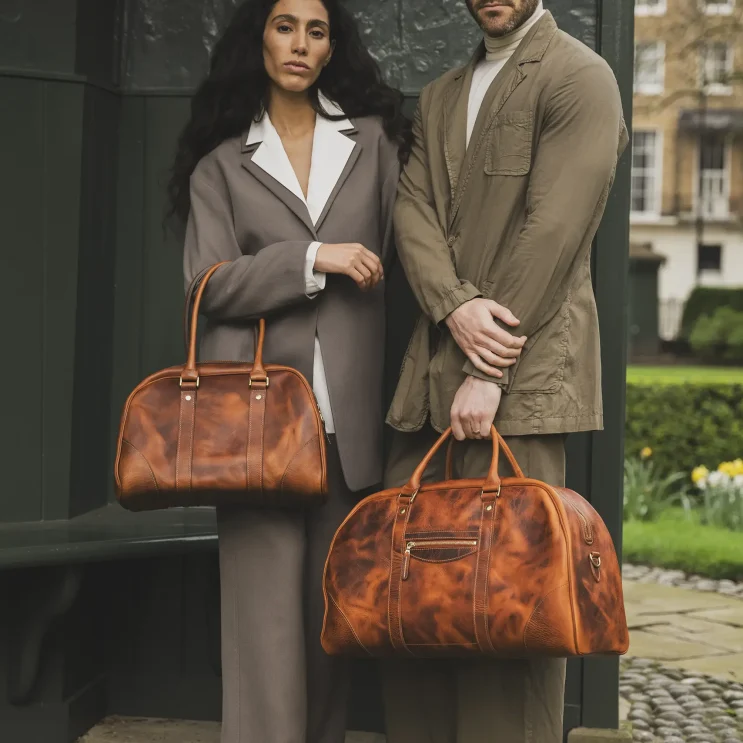 Woman and Man with Beorma Leather Company Stamford and Chetham bags