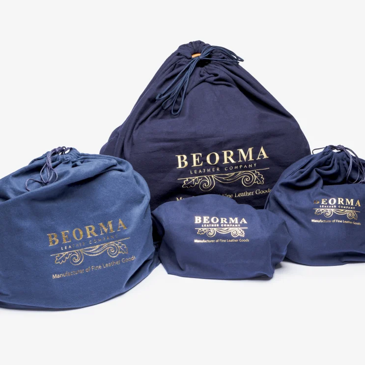 Beorma Leather Company bags in blue dust bags