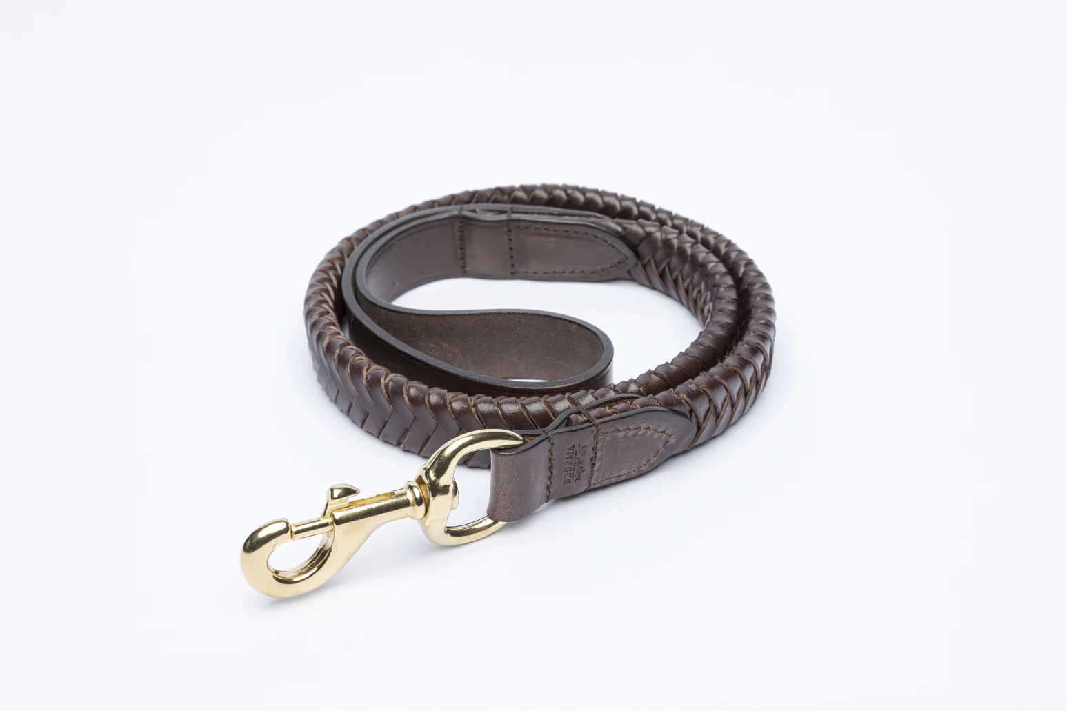 Plaited Dog Lead in Vegetable Tan Leather in Dark Brown coiled